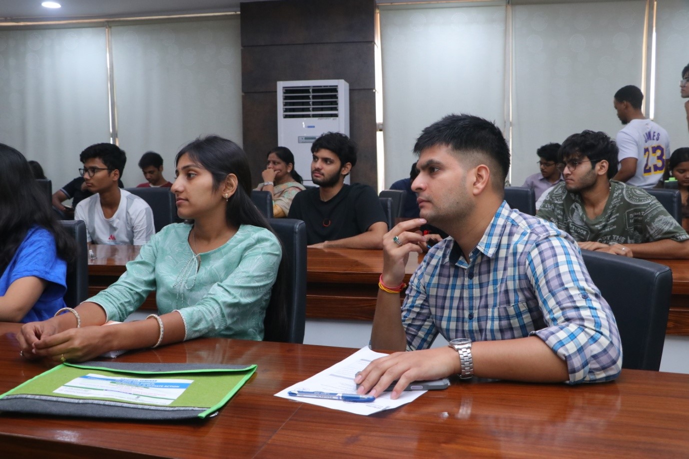 Student delegates and scholars participating in technical sessions